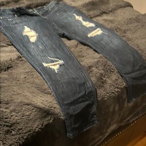 Jennifer Lopez Blue Skinny Jeans with Distressed Details